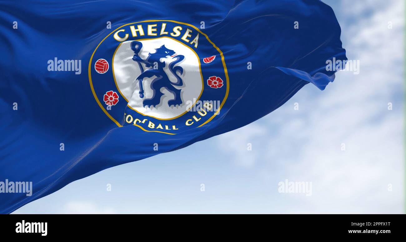 The flag of Chelsea Football Club waving in the wind on a clear day Stock Photo