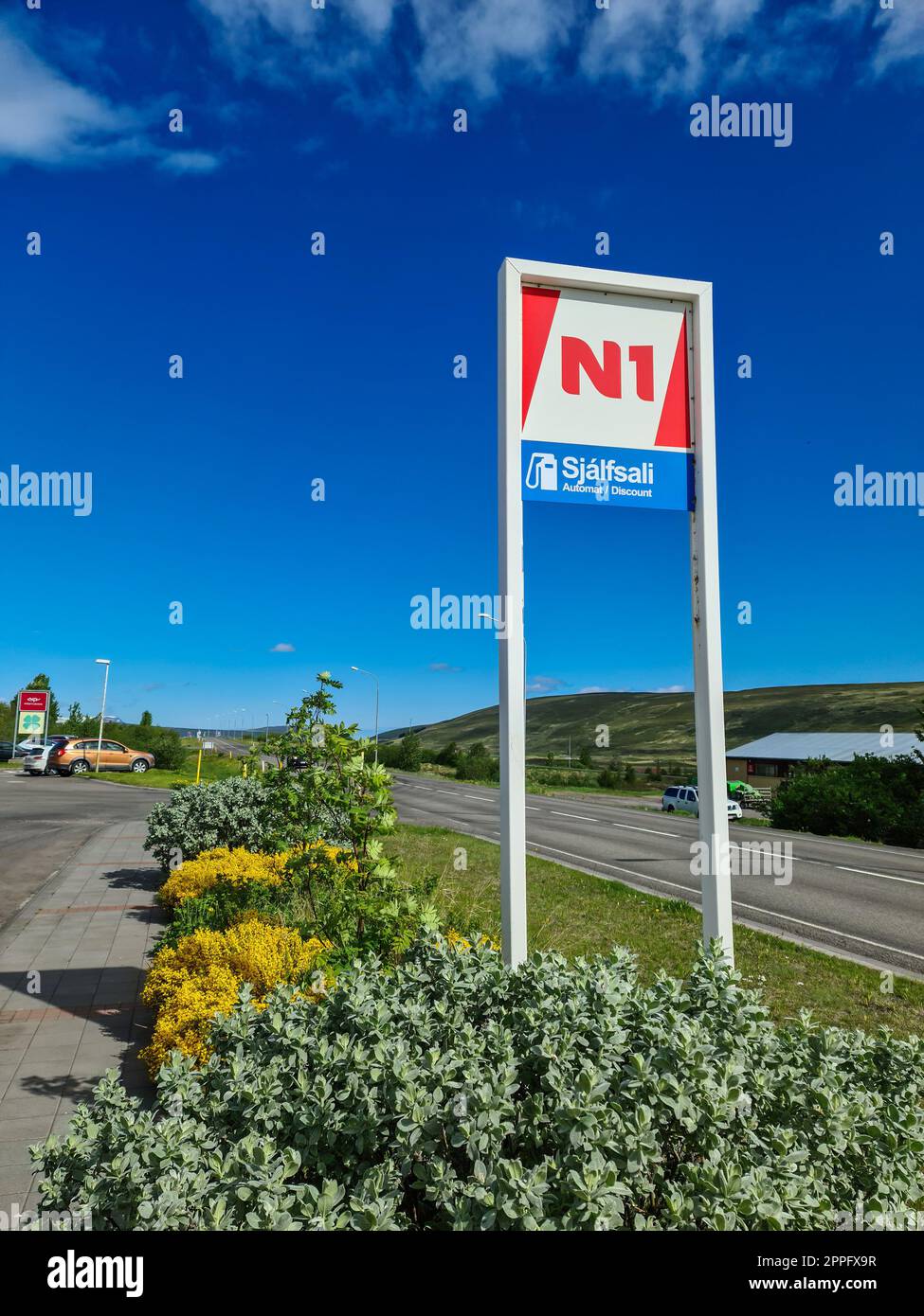 An Icelandic petrol station of the company Orkan - company logos and petrol prices in Icelandic landscape Stock Photo