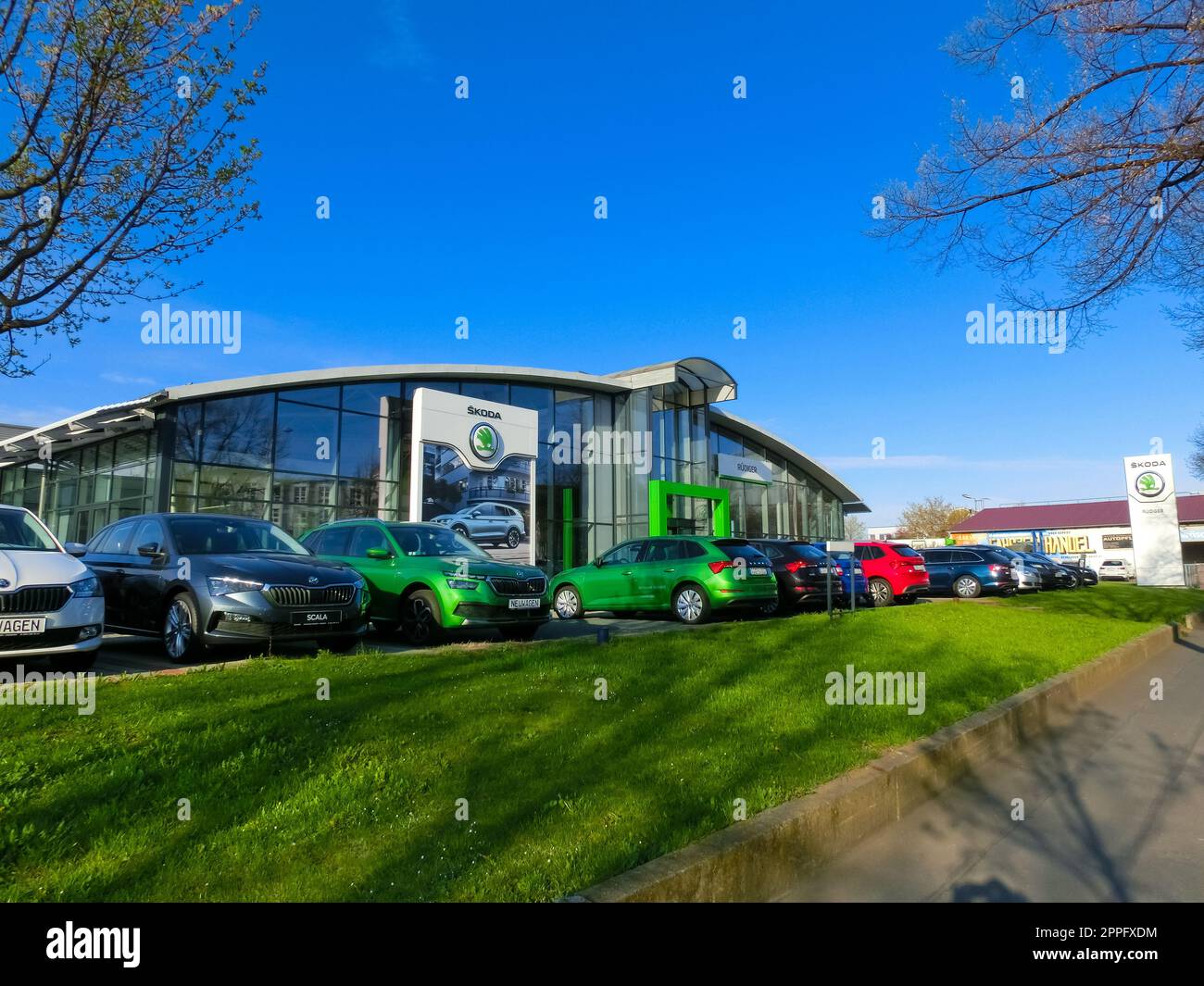Company store building with an emblem of Skoda Auto, Czech automobile
