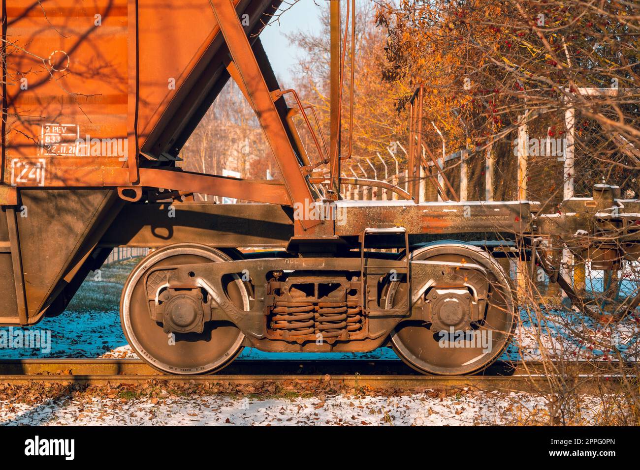 Wheels of freight cars with bulk cargo Stock Photo