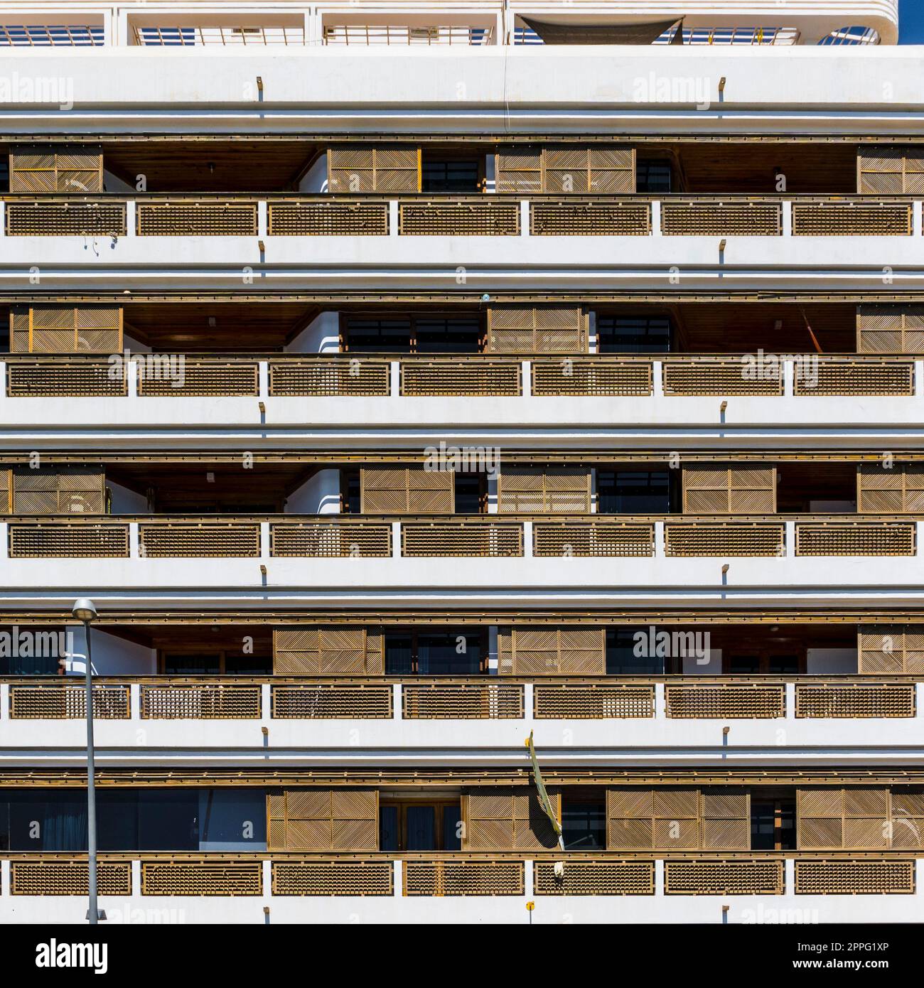 View on apartment building with wooden balconies Stock Photo - Alamy