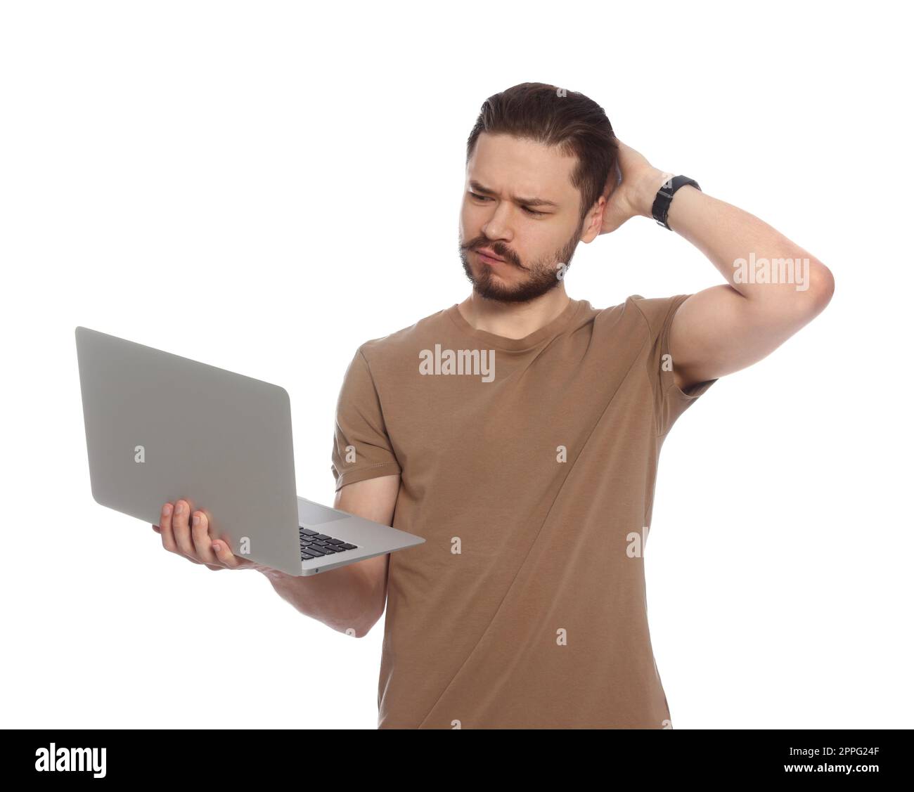 Pensive man using laptop on white background Stock Photo