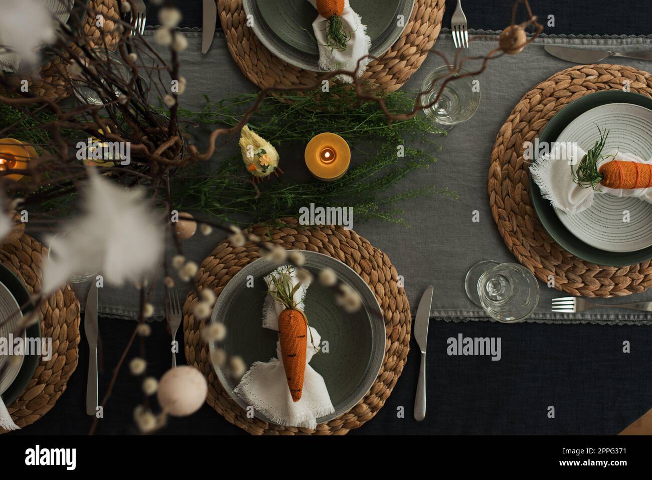 easter dinner table decorated ready for a family celebration Stock Photo