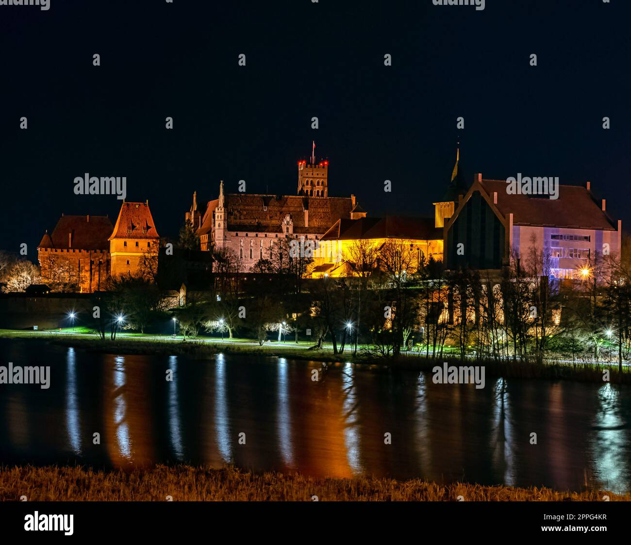 Castle of the Teutonic Order by night in Malbork, Pomerania, Poland Stock Photo
