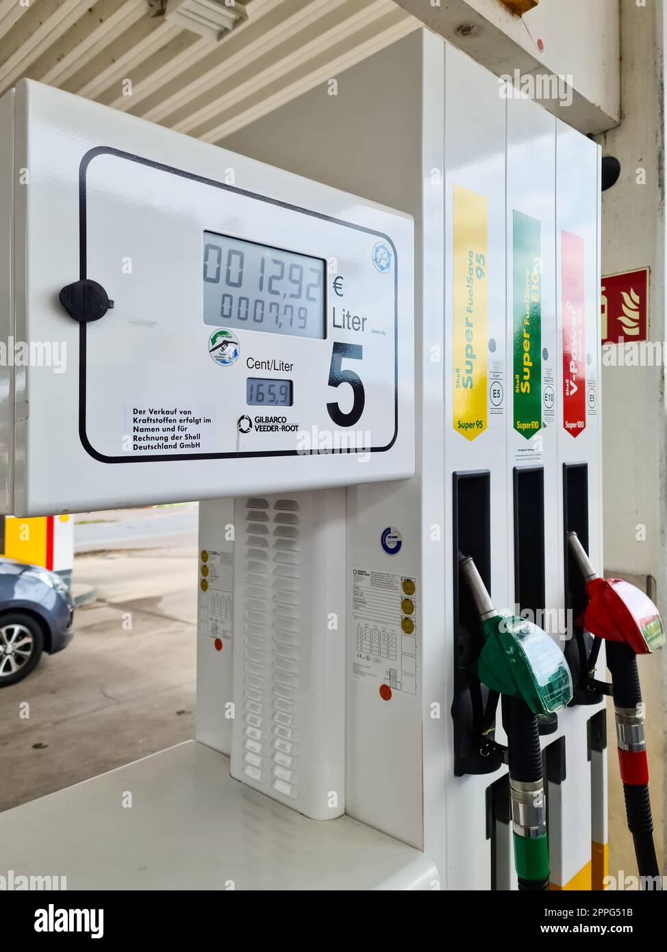 Kiel, Germany - 04. August 2022: Petrol pump of a Shell brand petrol station filling up with petrol. Stock Photo