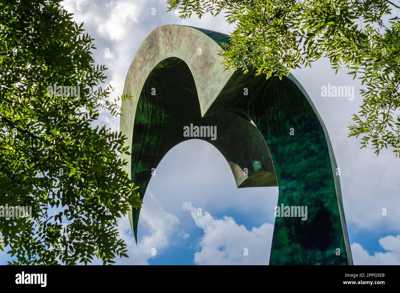 MADRID, SPAIN - JUNE 6, 2021: Modern sculpture entitled 'Encuentros' ('Encounters'), by Melilla sculptor Mustafa Arruf, donated to Madrid, which placed it in 1997 in Juan Carlos I Park Stock Photo