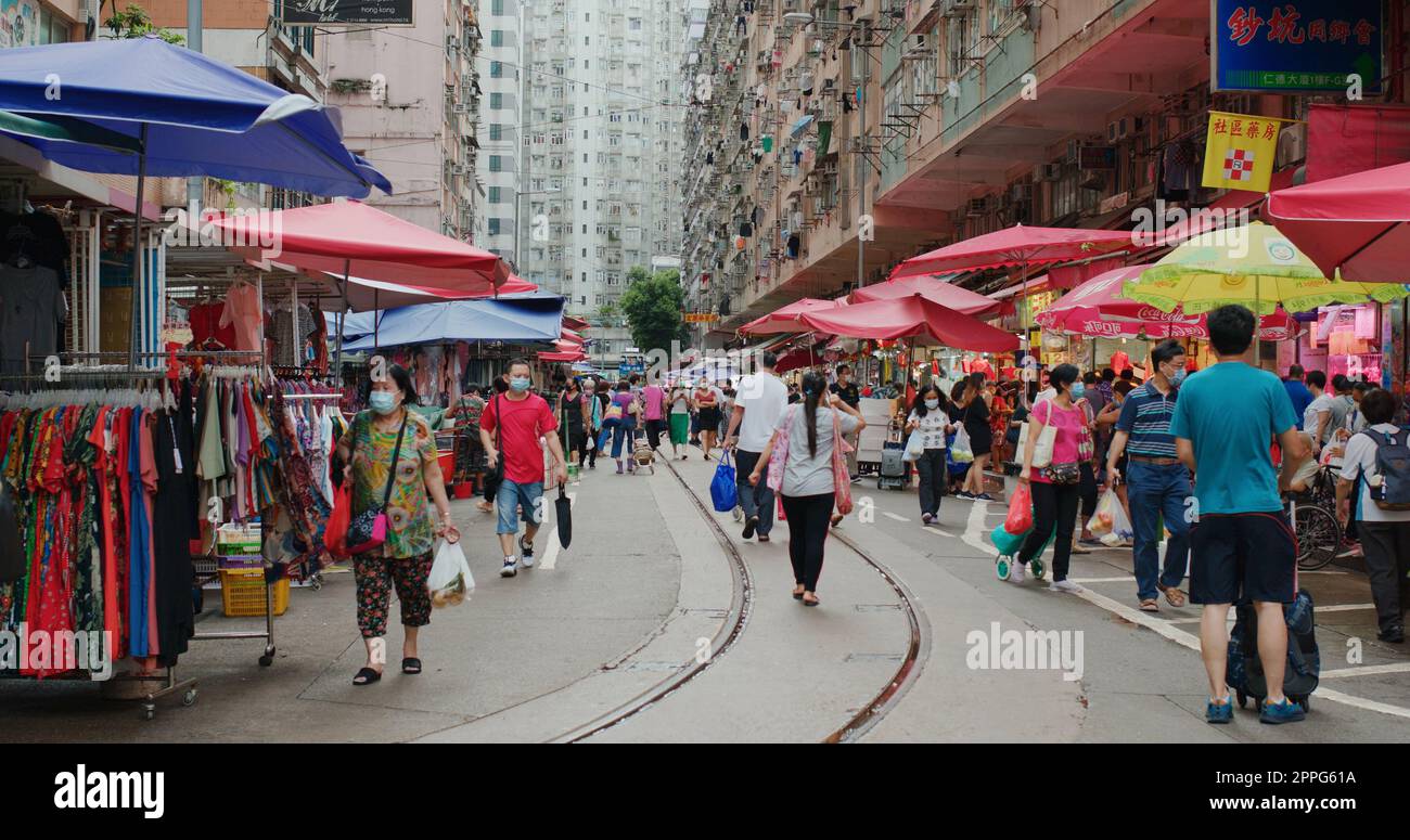 North Point, Hong Kong 17 August 2020:   Moving tram in Hong Kong wet market Stock Photo