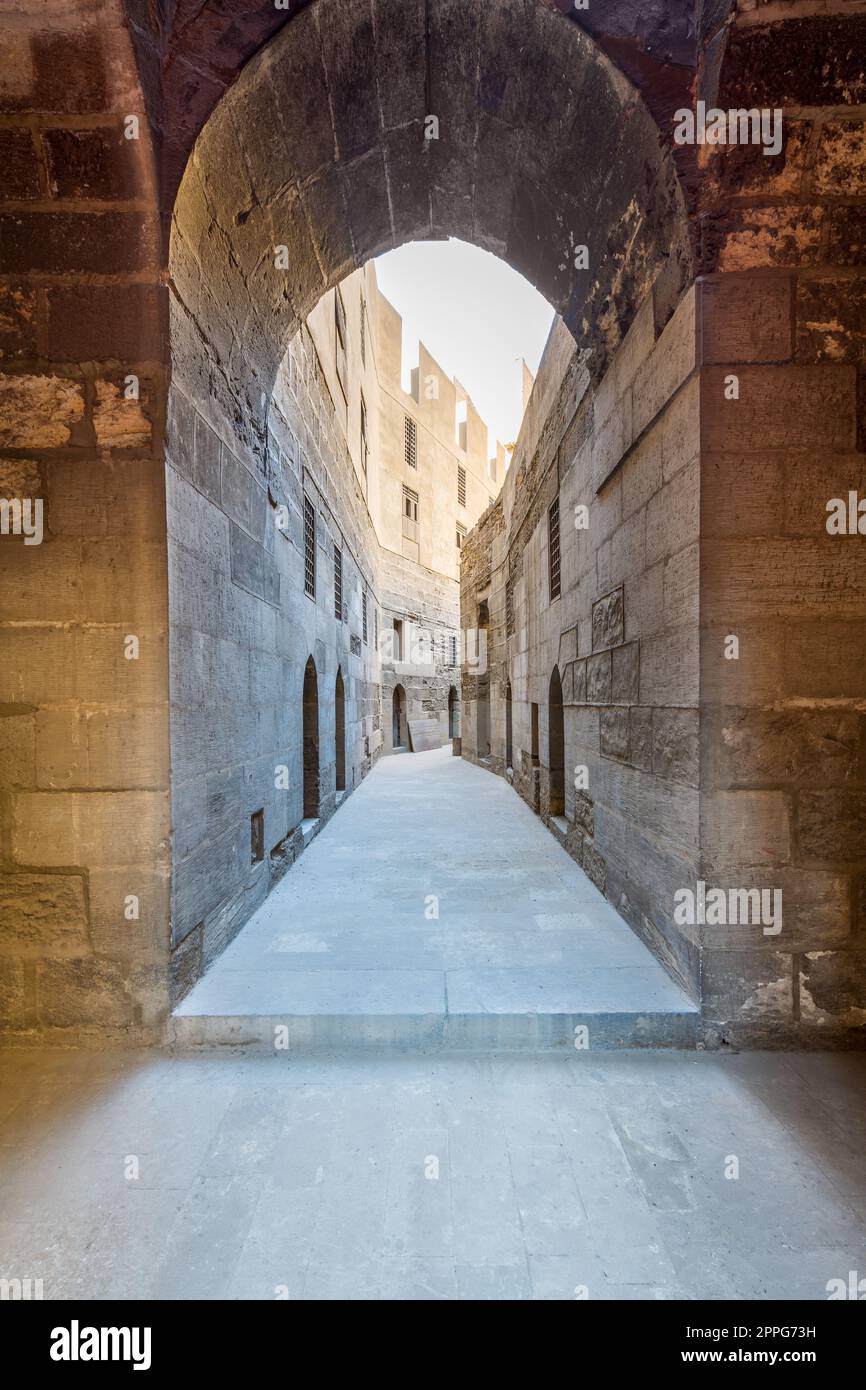 Narrow passage with old grunge stone walls, Cairo, Egypt Stock Photo