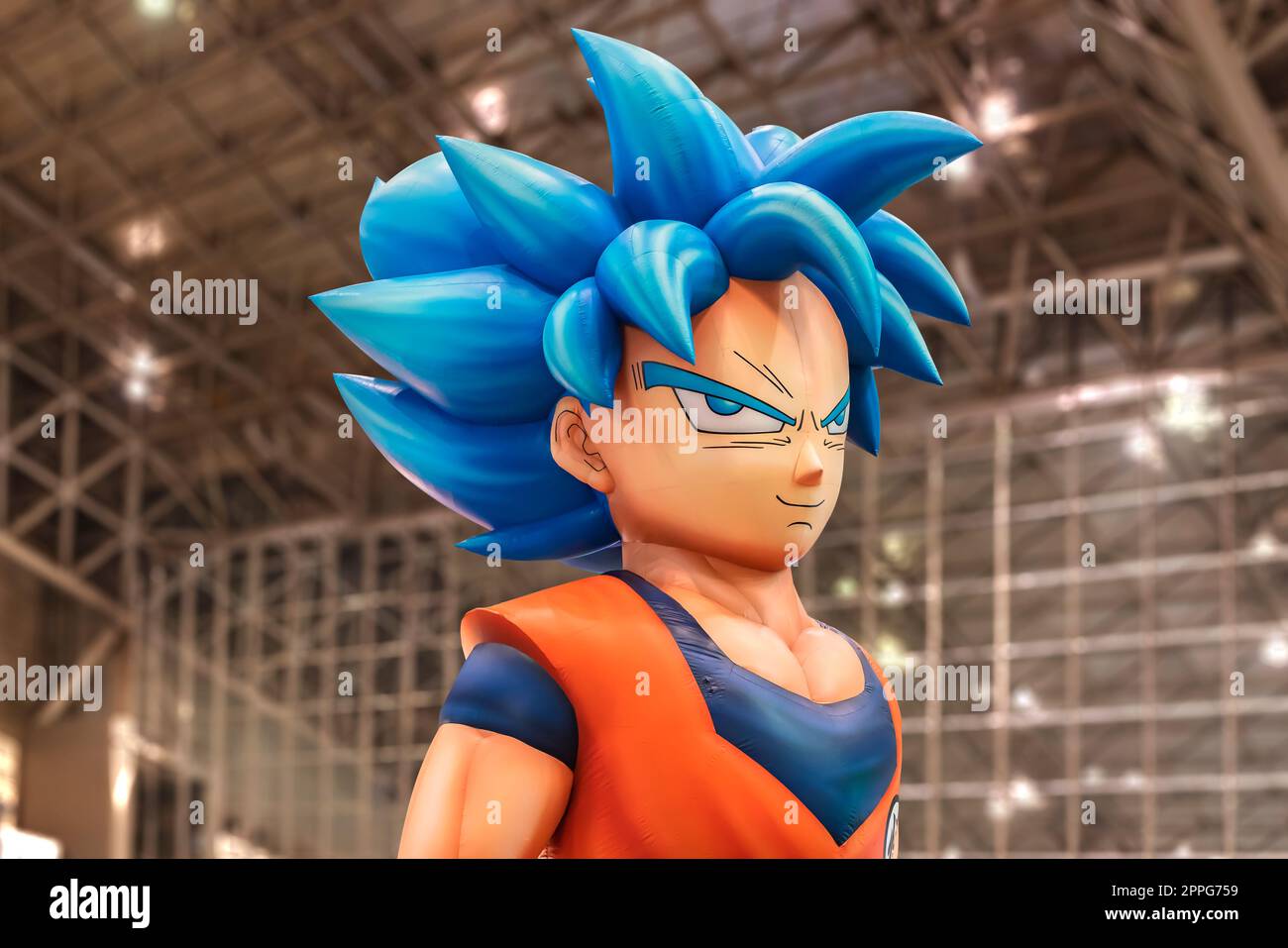 chiba, japan - december 22 2018: Huge inflatable structure of the bust of Son Goku character from the anime and manga serie of Dragon Ball floating under the ceiling of the anime convention Jump Festa Stock Photo