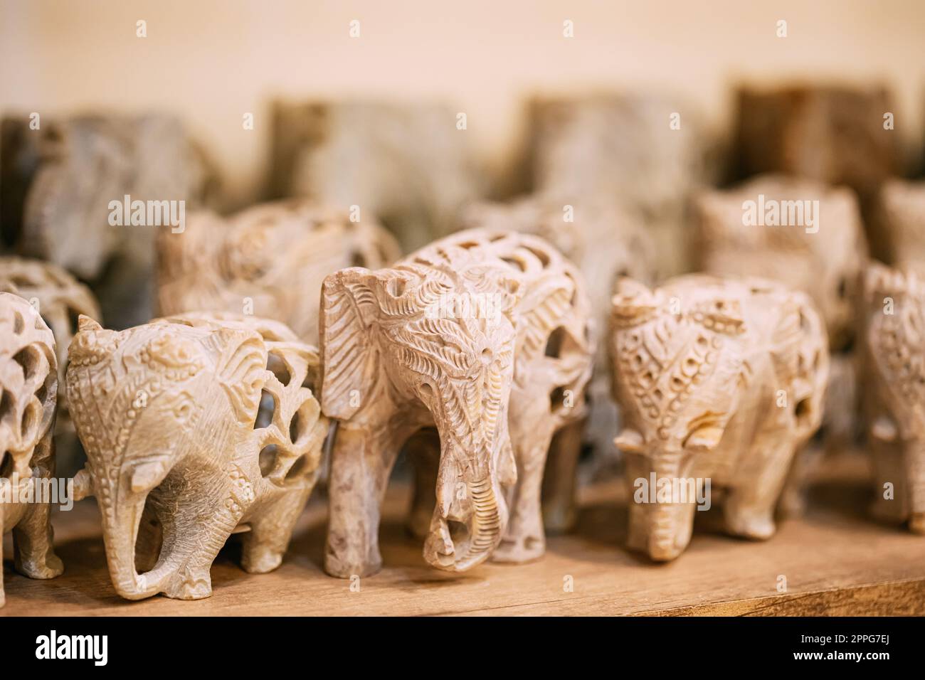 Goa, India. Elephants Souvenirs Of Stone On Shelf In Store. Goods For Tourists Stock Photo