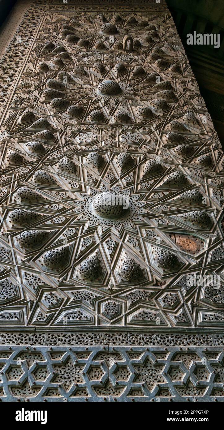 Geometrical engraved bronze decorations of the main entrance of Al Moaayad mosque, Cairo, Egypt Stock Photo
