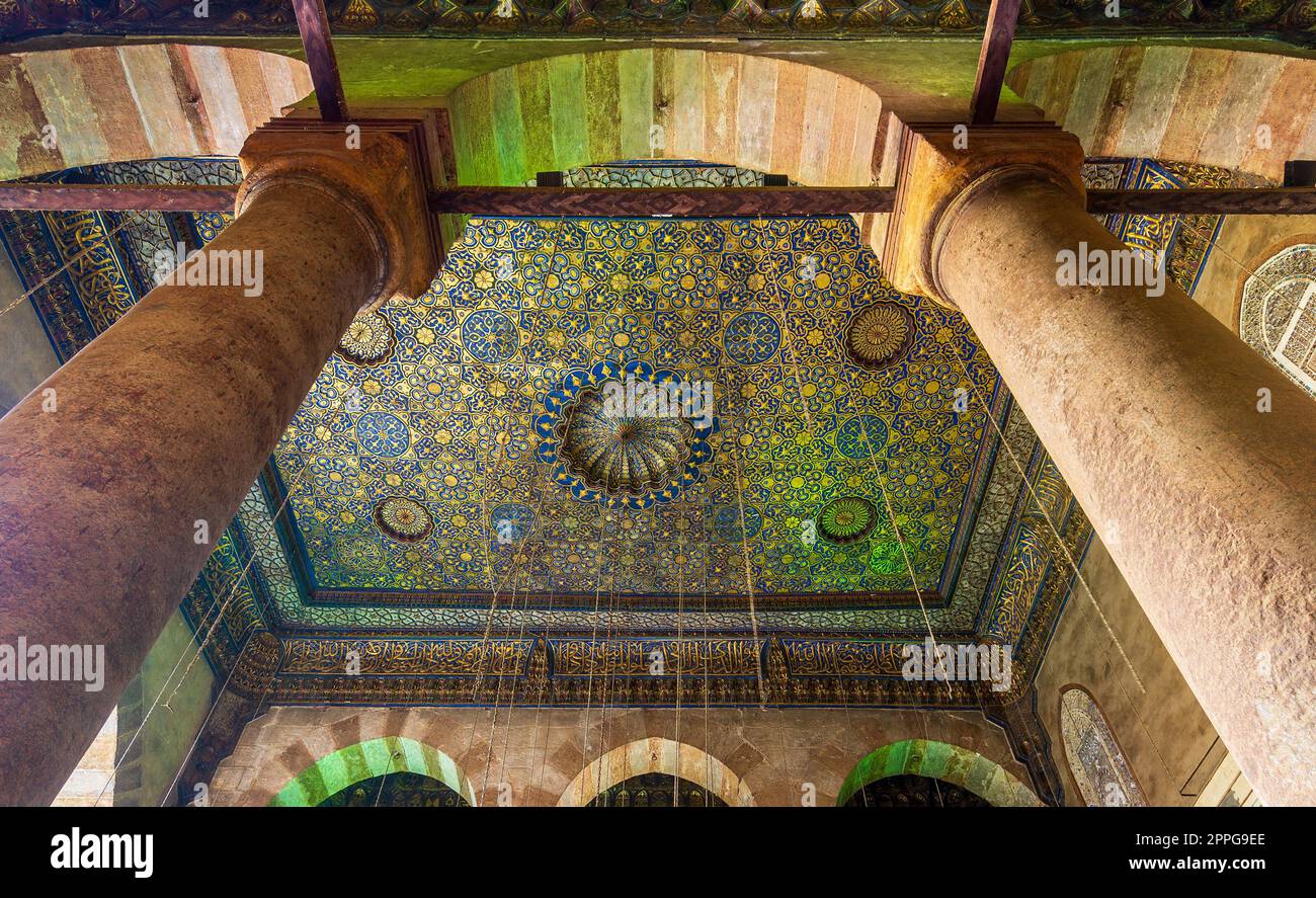 Ceiling of Sultan Barquq mosque with blue and golden floral pattern decorations, Cairo, Egypt Stock Photo