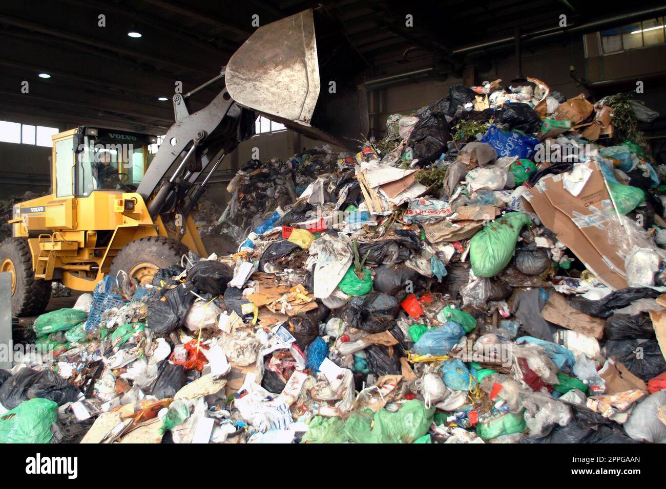 Turin, Piedmont/Italy03/24/2005Bulldozer move pile of waste in a landfill Stock Photo Alamy