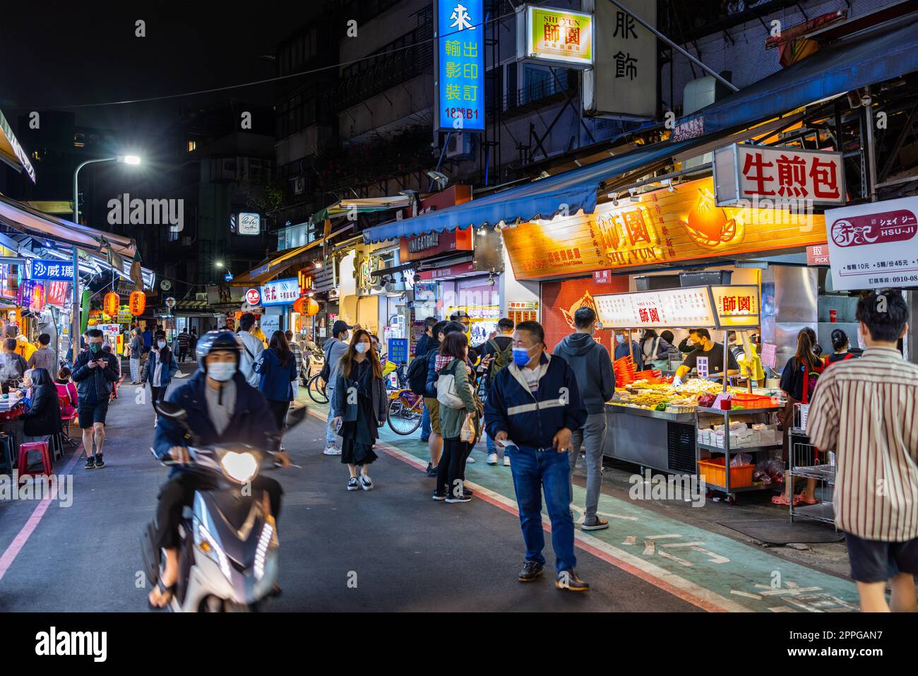 Taipei, Taiwan 22 March 2022: Shida Night Market in taipei city at night Stock Photo