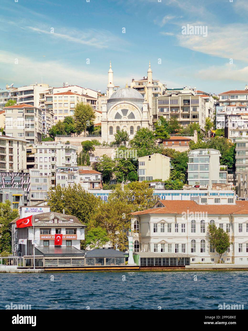 View from Bosphorus Strait at Karakoy district overlooking Cihangir mosque, and traditional houses, Istanbul, Turkey Stock Photo