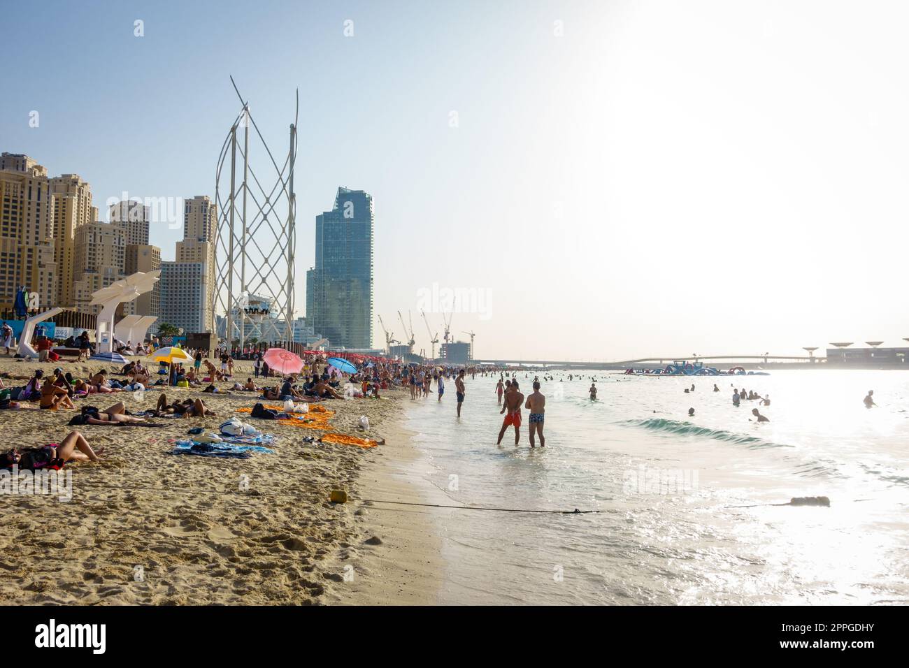 Dubai, UAE, February 23, 2018 Crowded beach at Jumeirah Beach
