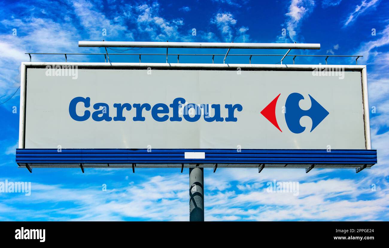 Advertisement billboard displaying logo of Carrefour Stock Photo