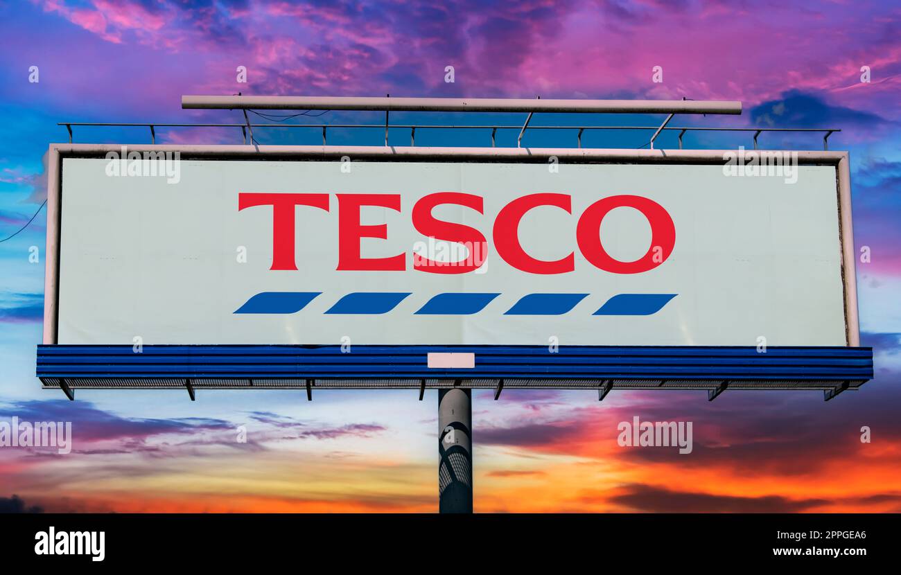 Advertisement billboard displaying logo of Tesco Stock Photo Alamy