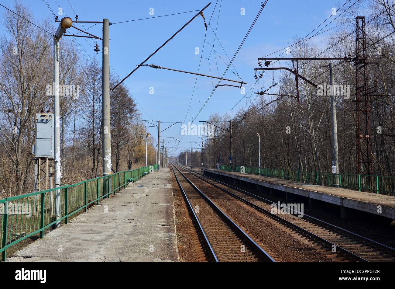 A railway station with platforms for waiting for trains Stock Photo