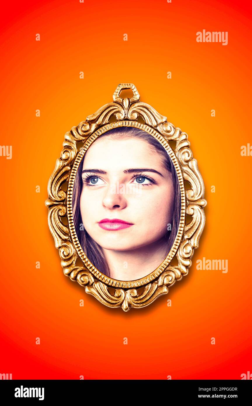 young woman face inside a cameo frame Stock Photo Alamy