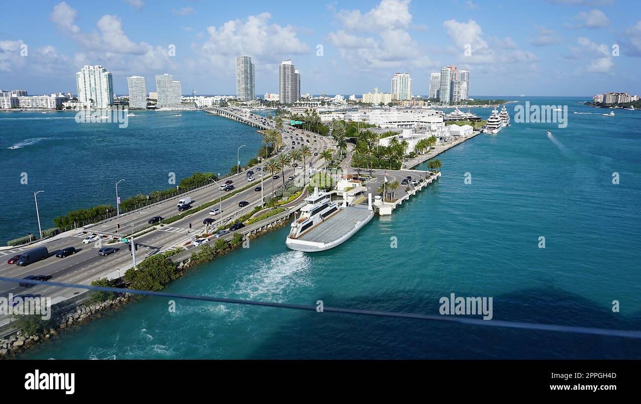 A ferry carrying vehicles to Fisher Island in Miami, Florida Stock