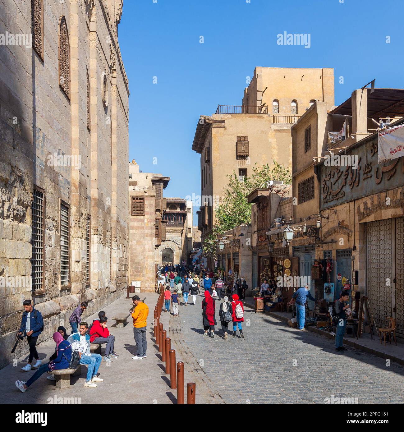 Moez Street with Barquq mosque and Sabil of Katkhuda historic building at far end, Cairo, Egypt Stock Photo