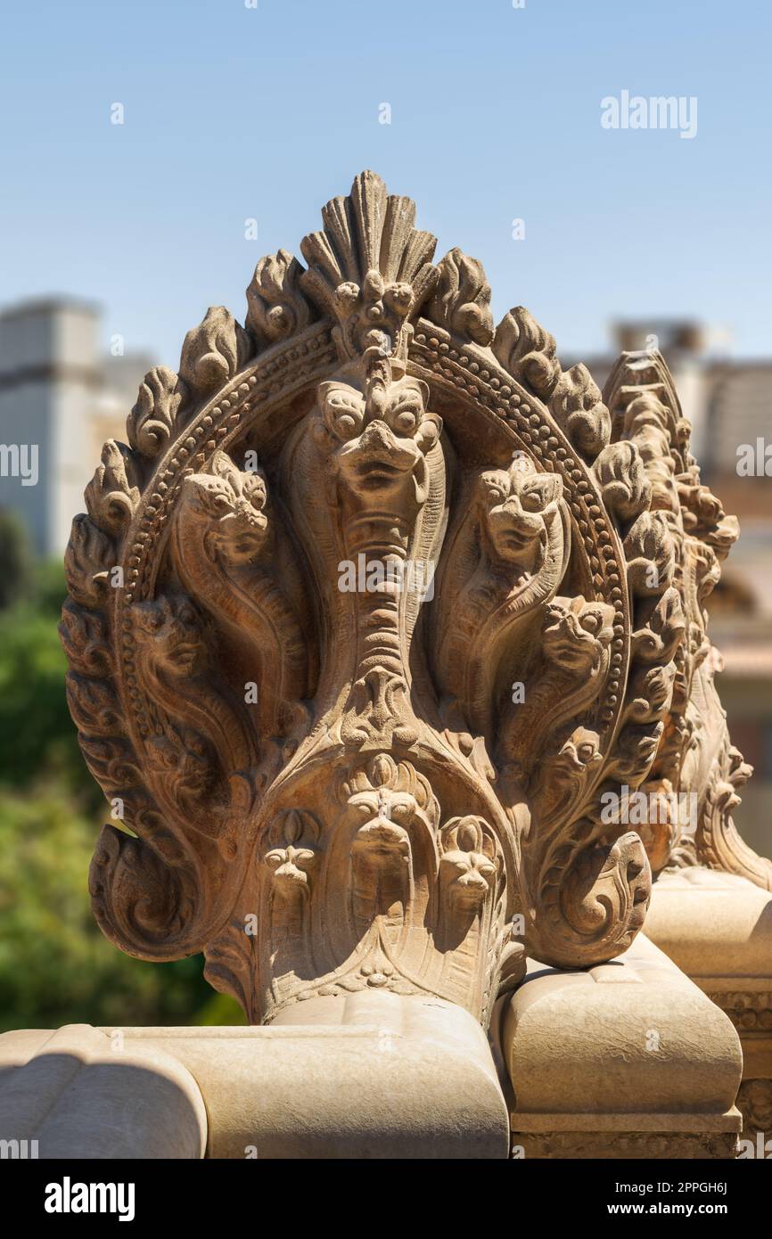 Hindu statue of snakes, Terrace of the historical palace of Baron Empain, Cairo, Egypt Stock Photo