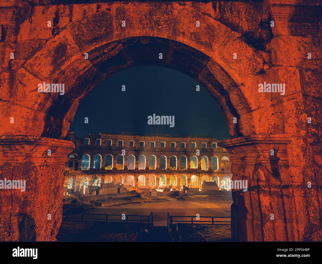 Croatia. Pula. Ruins of the best preserved Roman amphitheatre built in the first century AD during the reign of the Emperor Vespasian shot at night Stock Photo