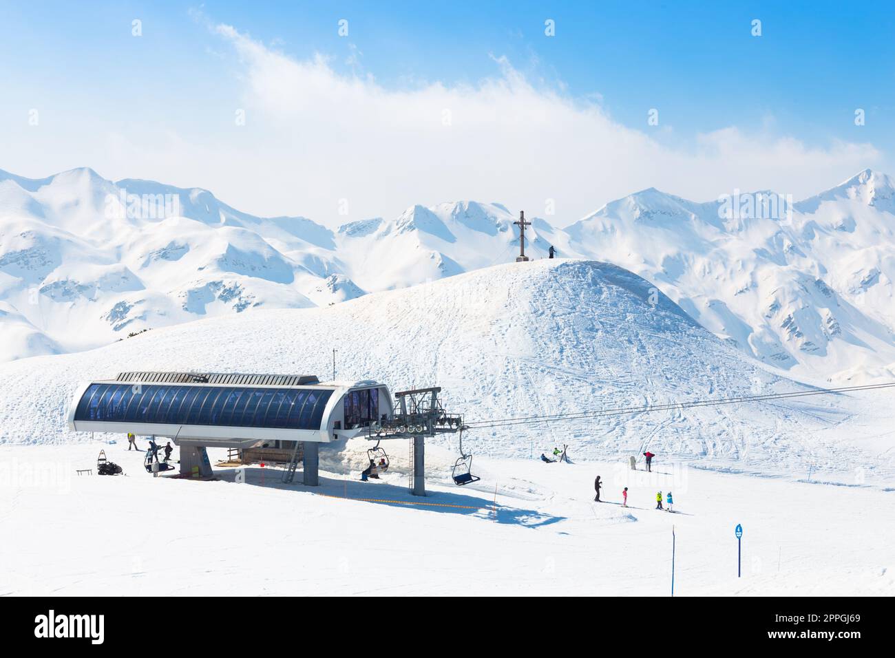 Skiers on ski lift at Vogel, Slovenia. Stock Photo