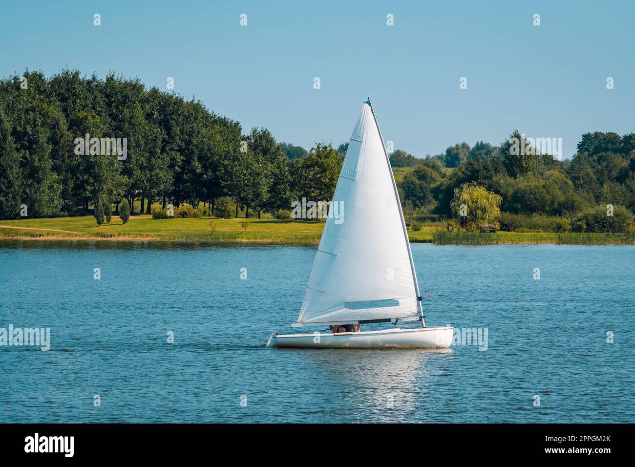 Calm water with a boat hi-res stock photography and images - Alamy