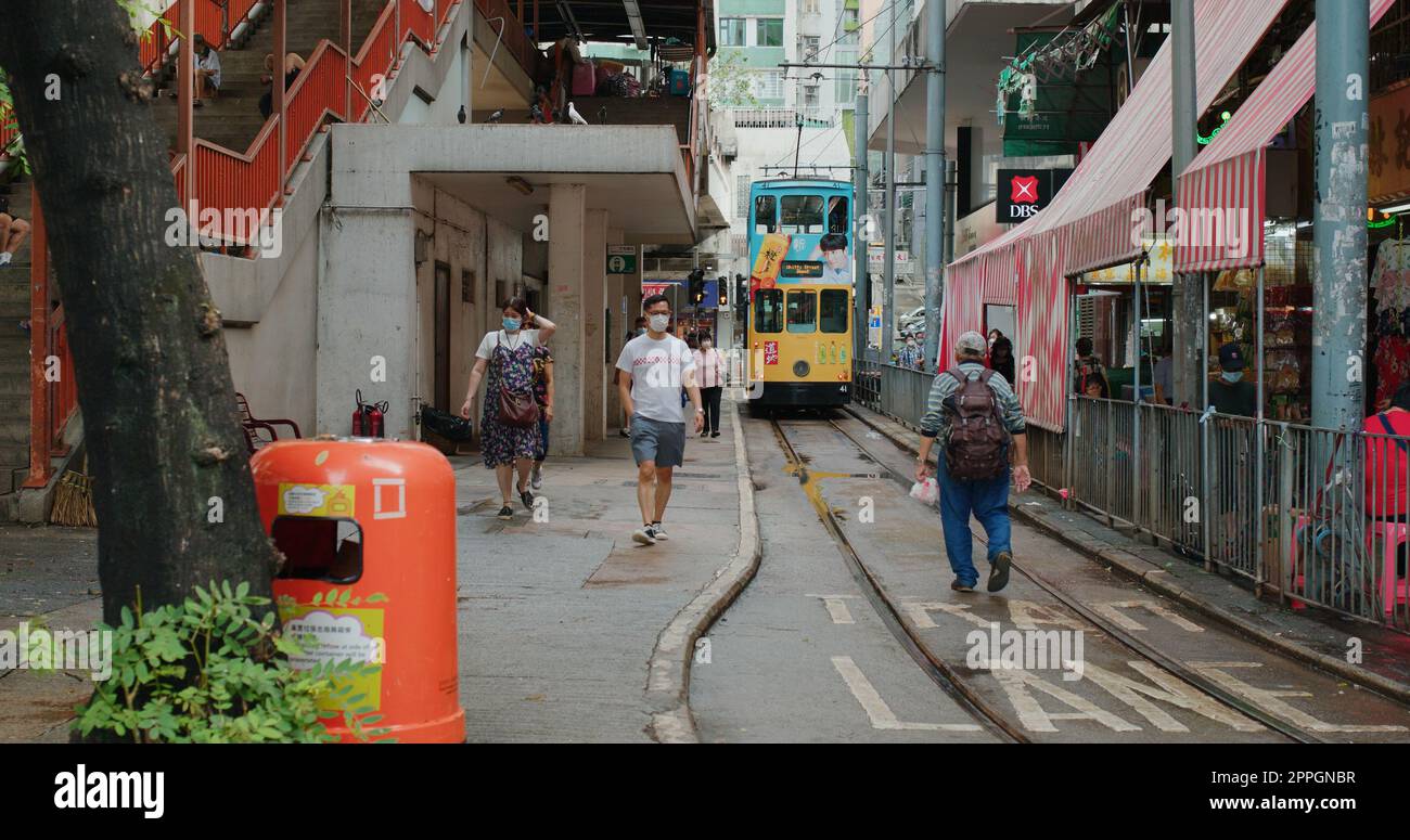 North Point, Hong Kong 17 August 2020:   Moving tram in Hong Kong wet market Stock Photo