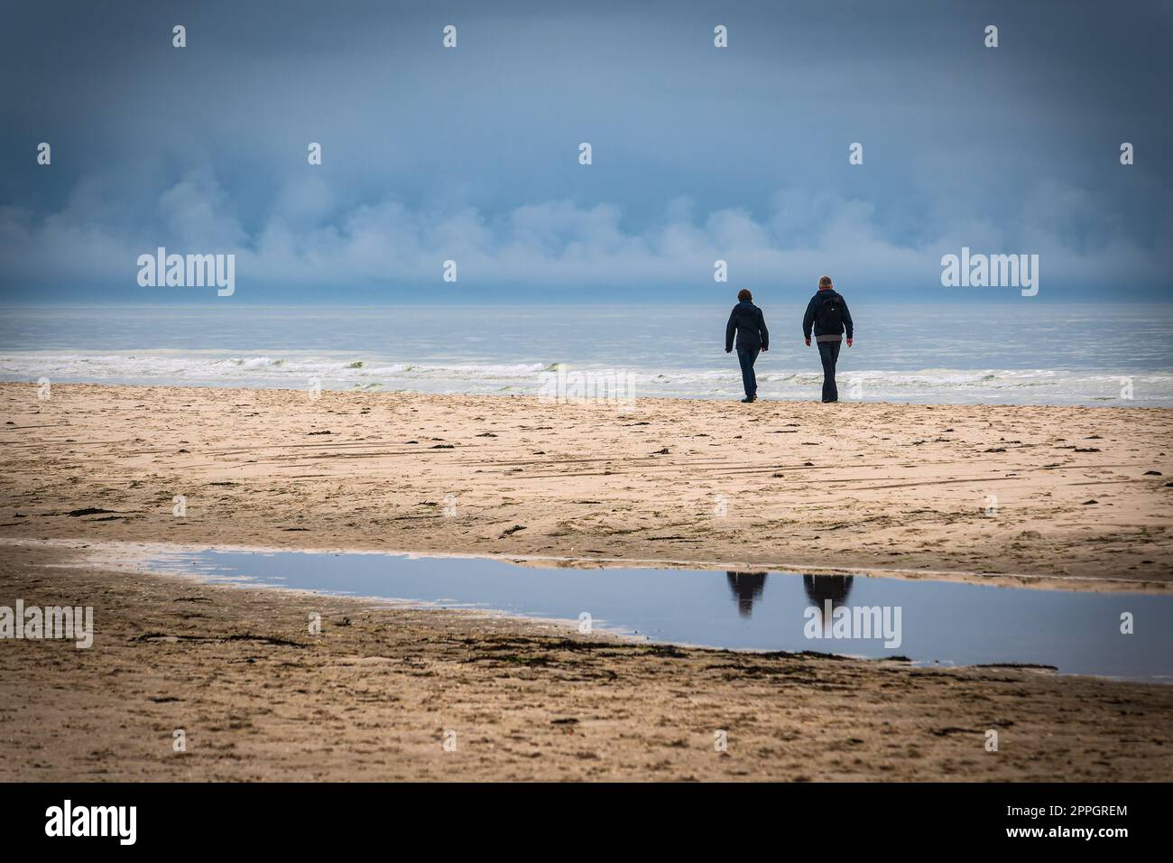 Walker on the North Sea island Amrum, Germany Stock Photo