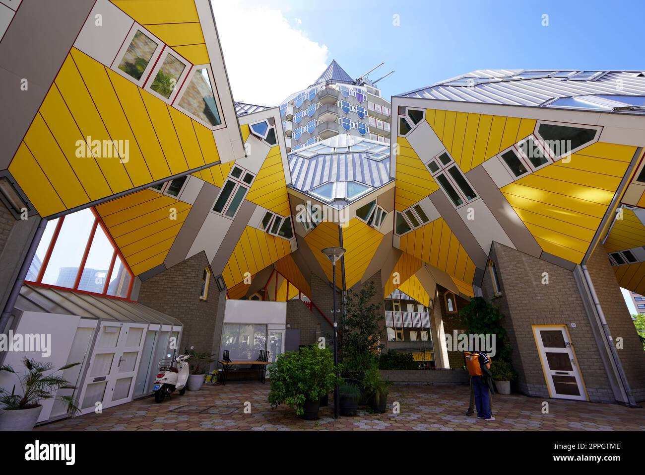 ROTTERDAM, NETHERLANDS - JUNE 9, 2022: Cube Houses and Blaak tower in Rotterdam, Netherlands Stock Photo
