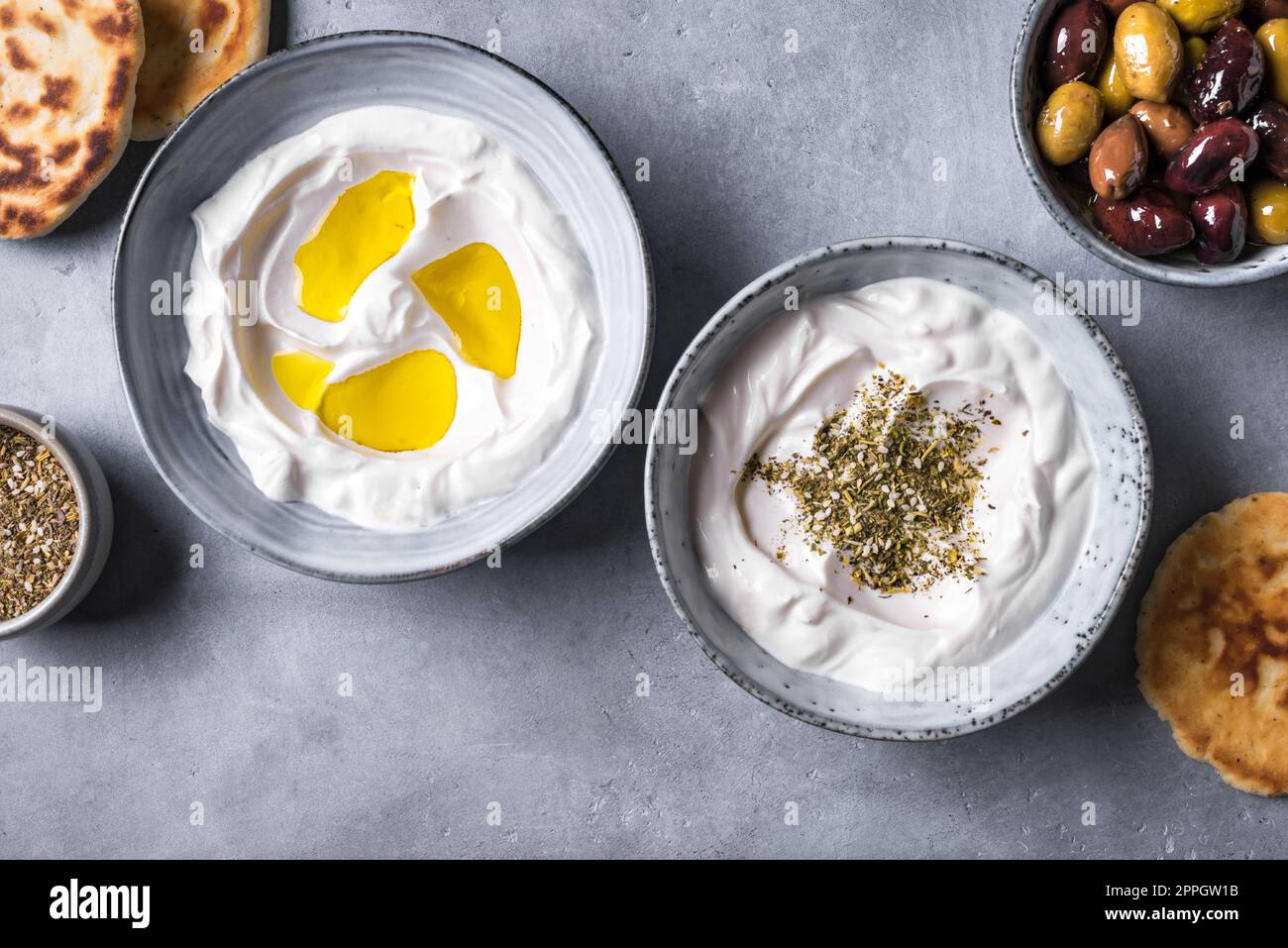 Labneh yogurt cream cheese with olive oil and zaatar close up