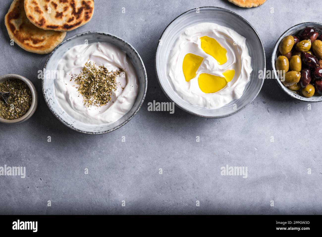 Labneh yogurt cream cheese with olive oil and zaatar, copy space