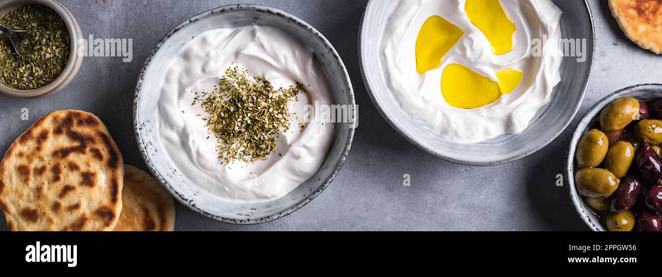 Labneh yogurt cream cheese with olive oil and zaatar, banner