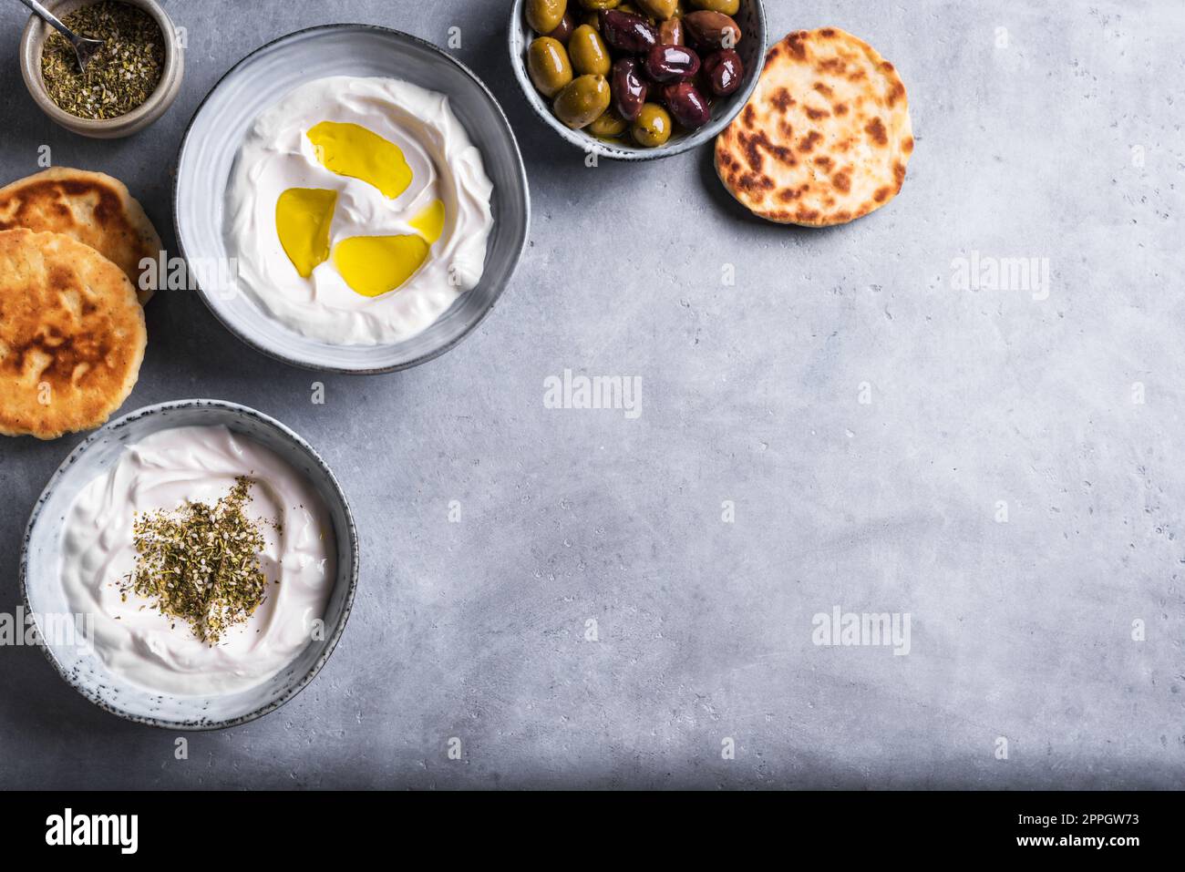 Labneh yogurt cream cheese with olive oil and zaatar, copy space