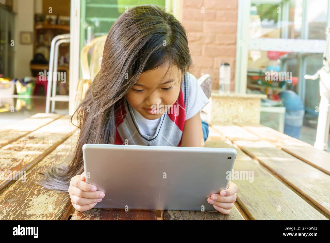 Children playing tablet Stock Photo
