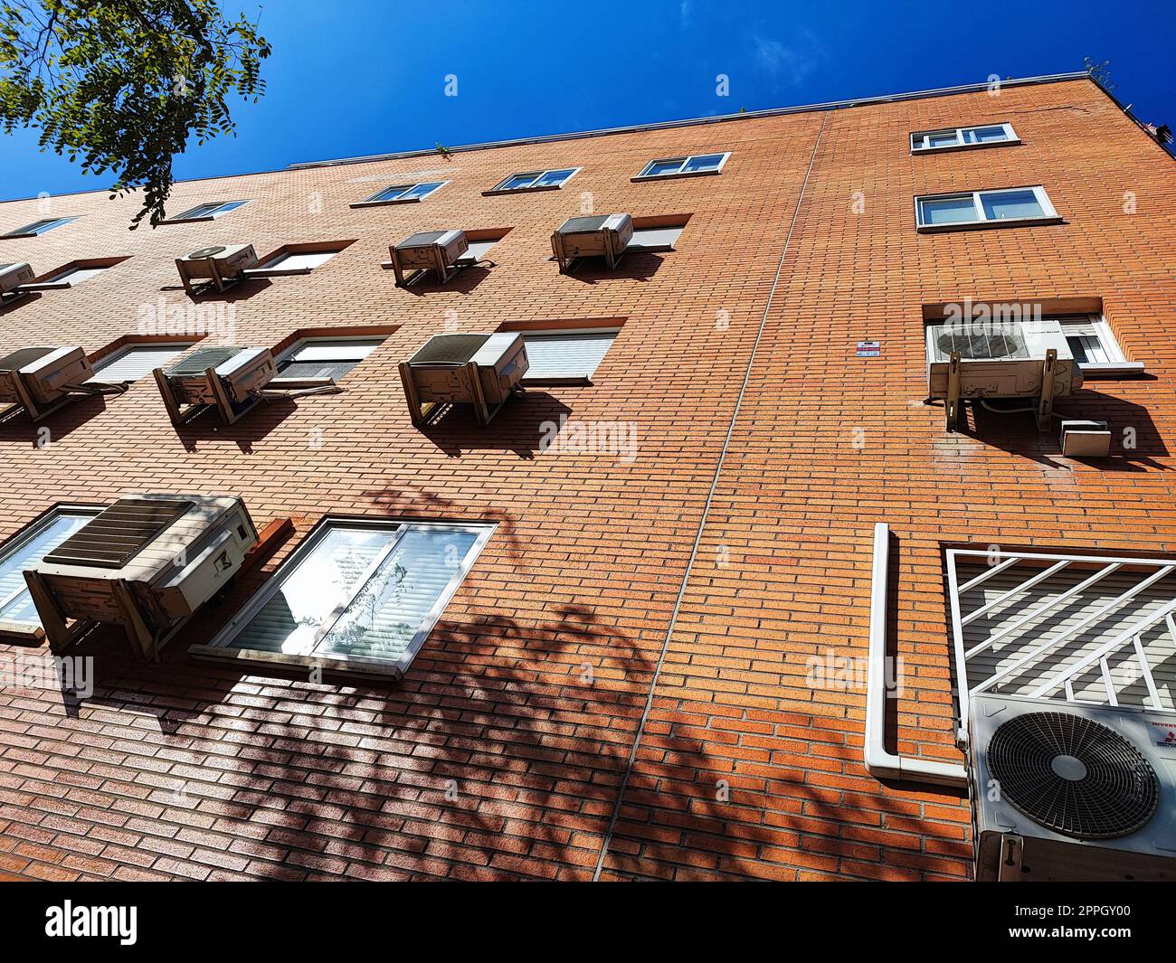 air conditioners on a residential building in madrid in spain Stock