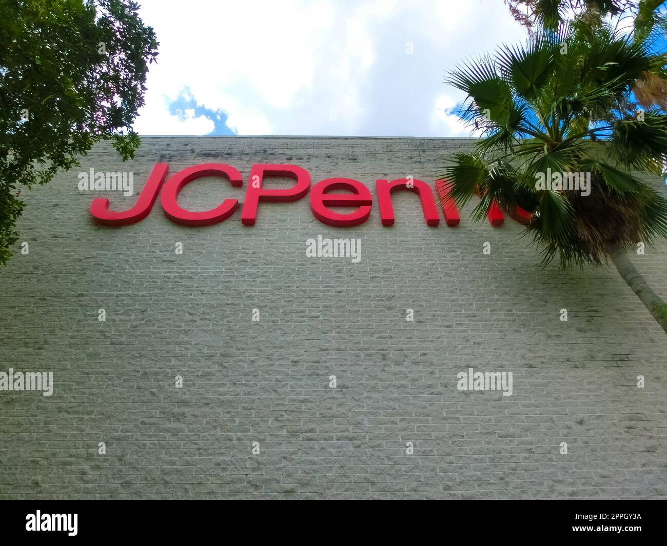 Closeup of JCPenney store sign on the building. JCPenney is an American department store chain. Stock Photo