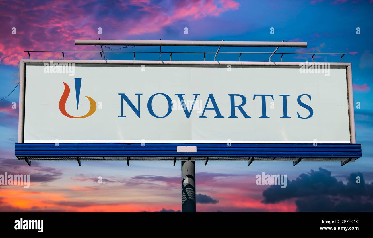 Advertisement billboard displaying logo of Novartis Stock Photo