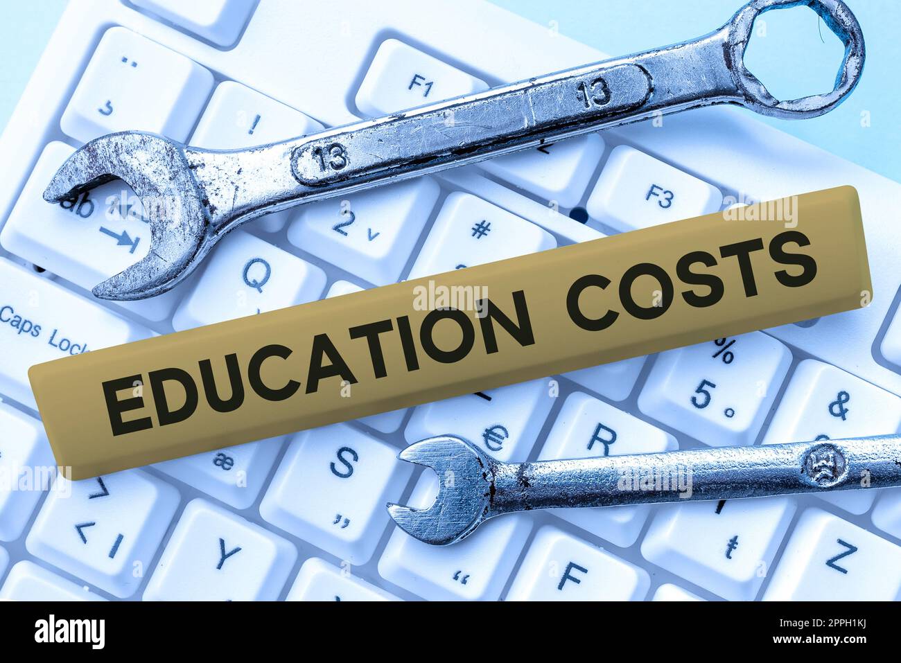 Sign displaying Education Costs. Business overview amounts paid for tuition fees and other related expenses Stock Photo
