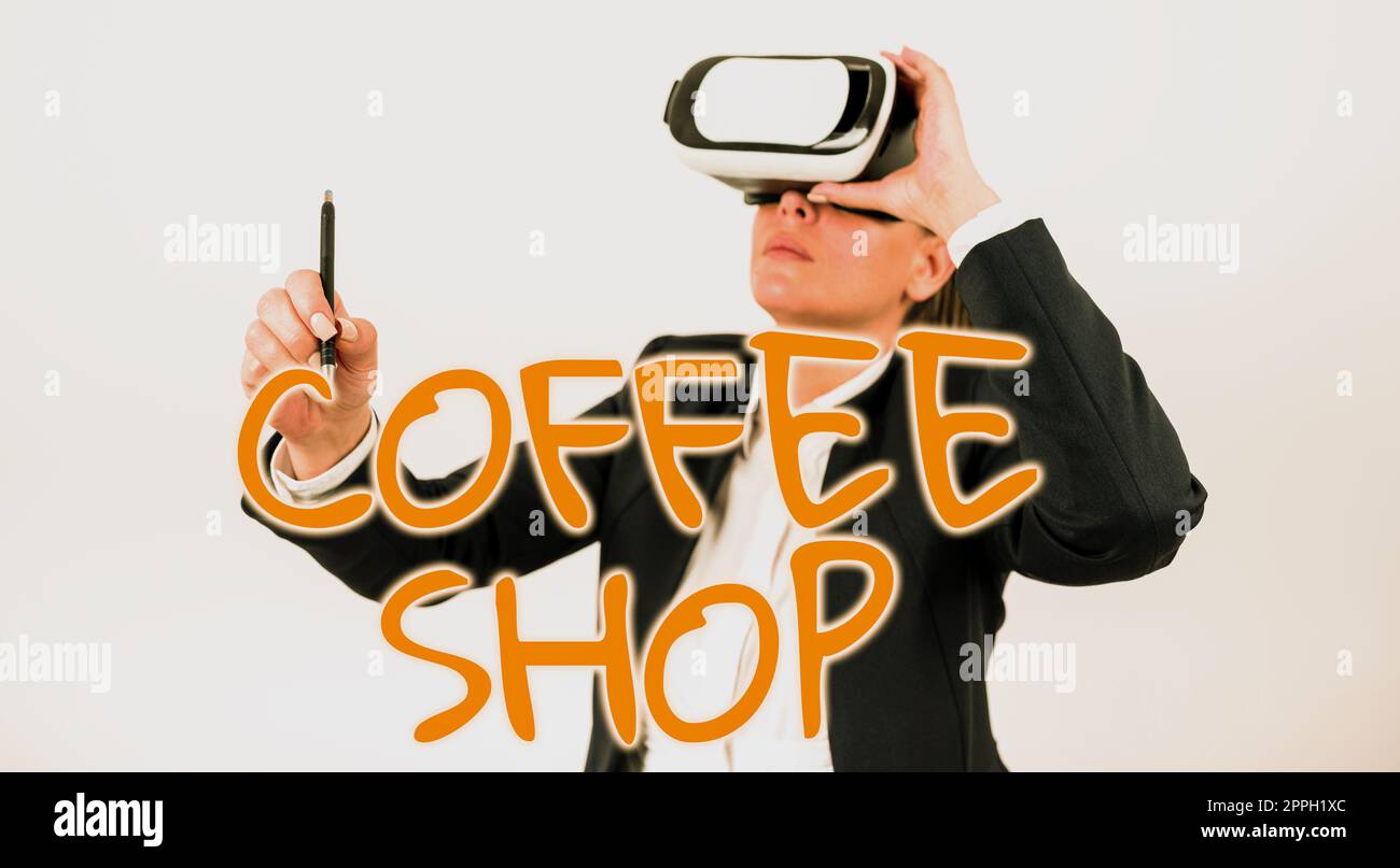 Hand writing sign Coffee Shop. Conceptual photo small informal restaurant serving coffee and light refreshments Stock Photo