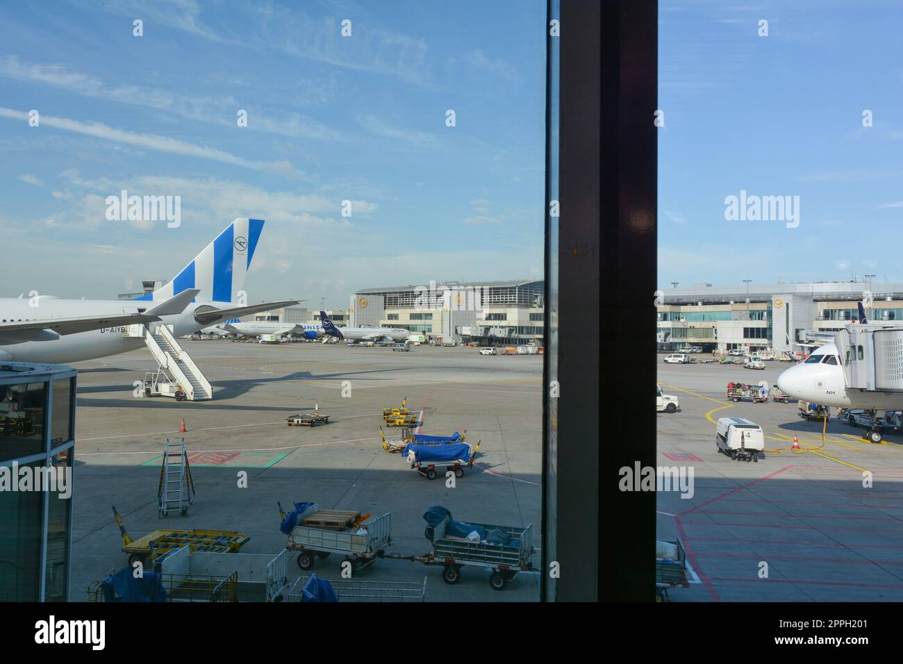 Frankfurt Airport Germany August 02, 2022 Airplanes and luggage