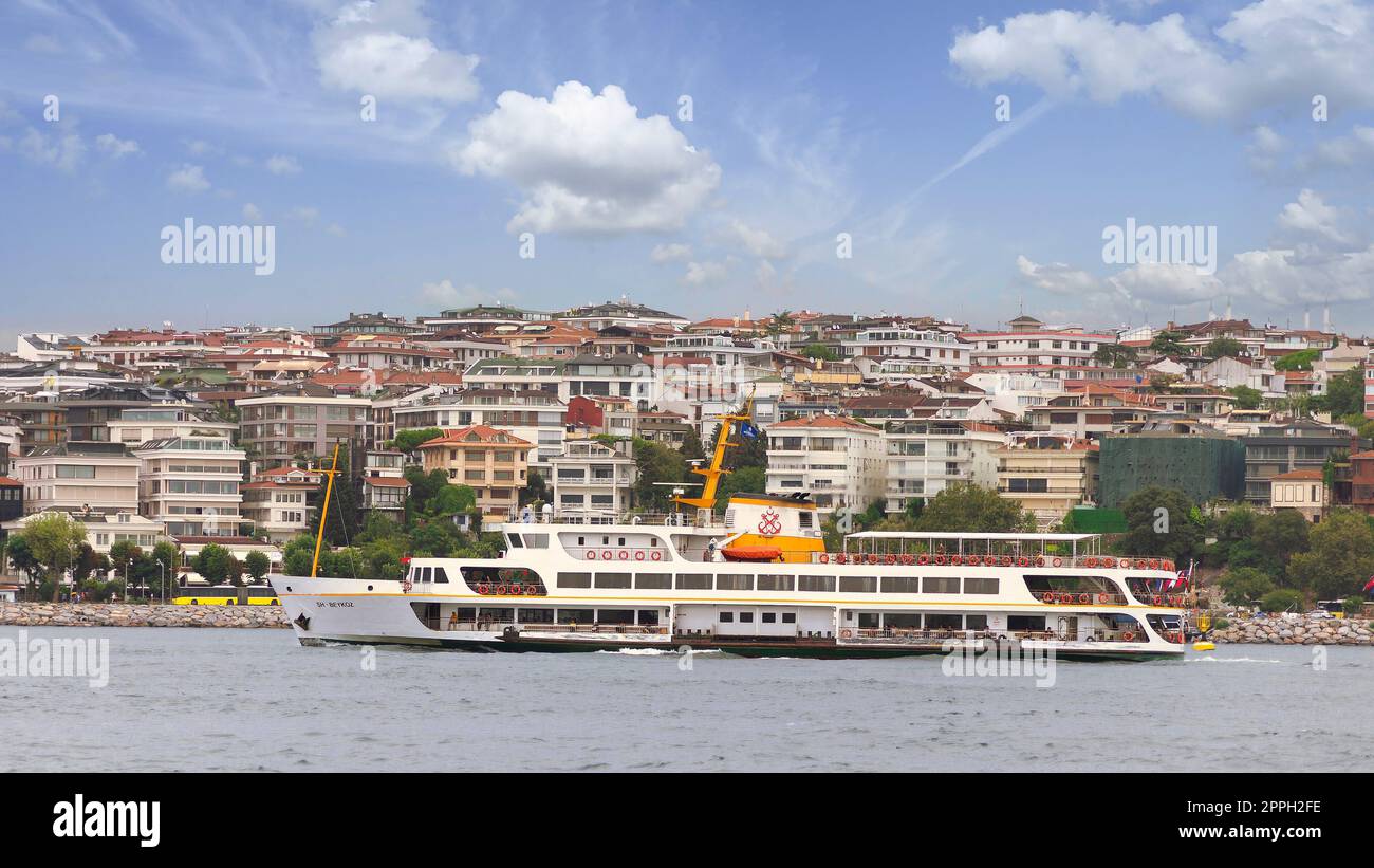 Ferry boat sailing in Marmara sea near Istanbul, passing by Kadikoy, Istanbul, Turkey Stock Photo
