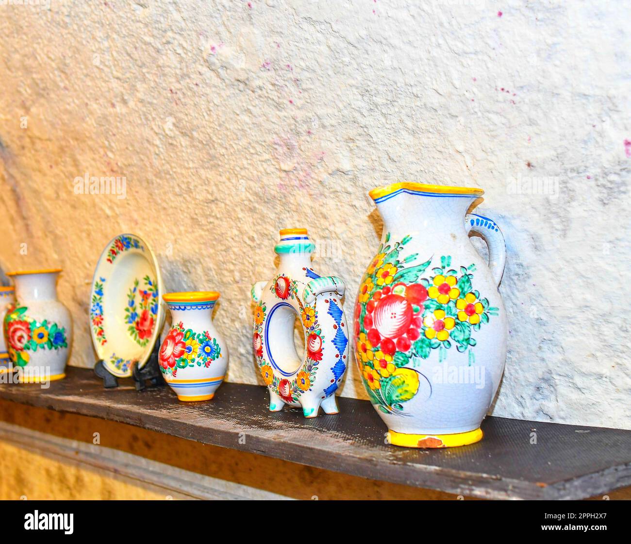 Range of Pottery Molds on a Wooden Shelf in Potters Studio. for