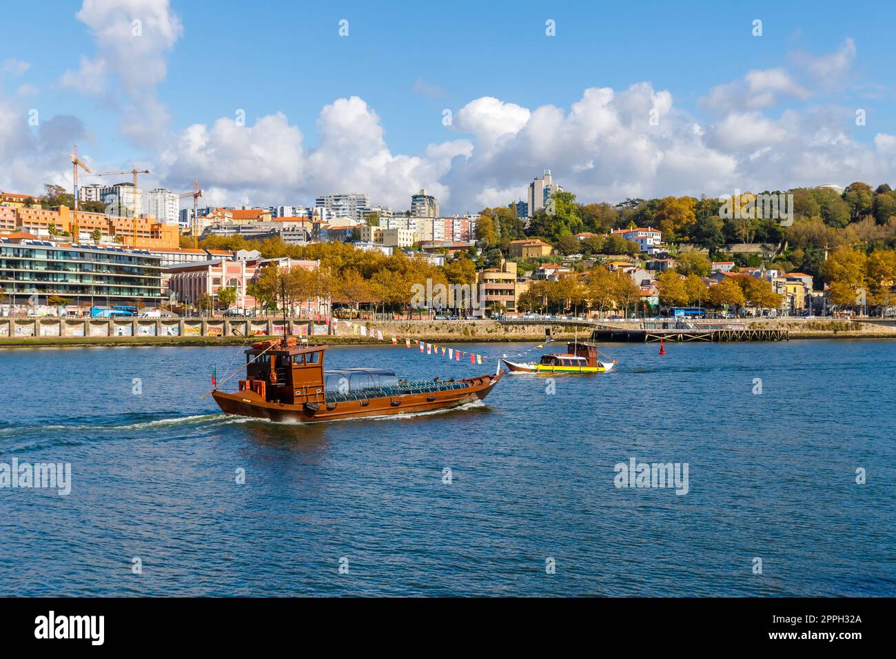 Carlota do Douro tourist transport boat sailing on the Douro river . Porto, Portugal Stock Photo