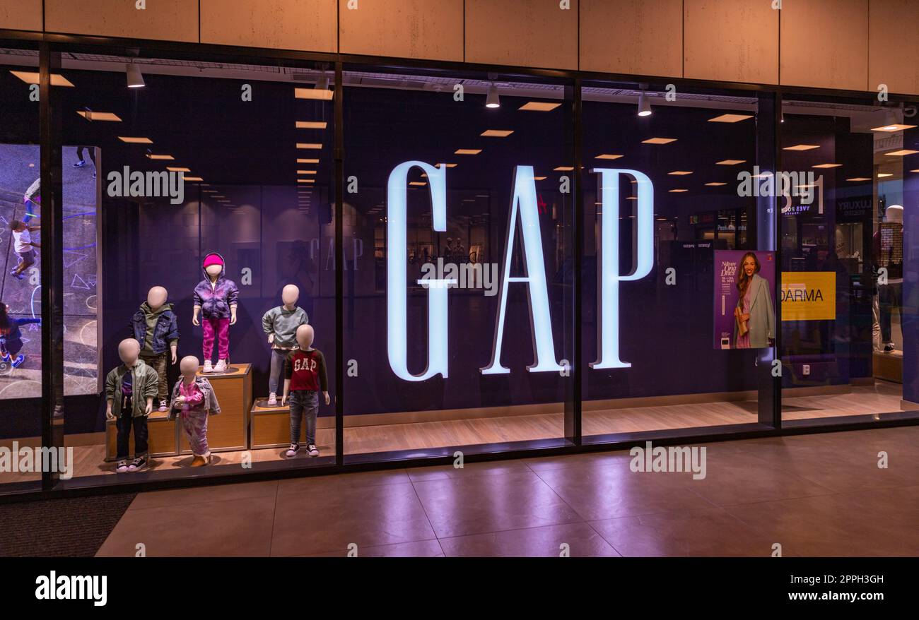 A picture of a GAP storefront inside of a mall Stock Photo Alamy