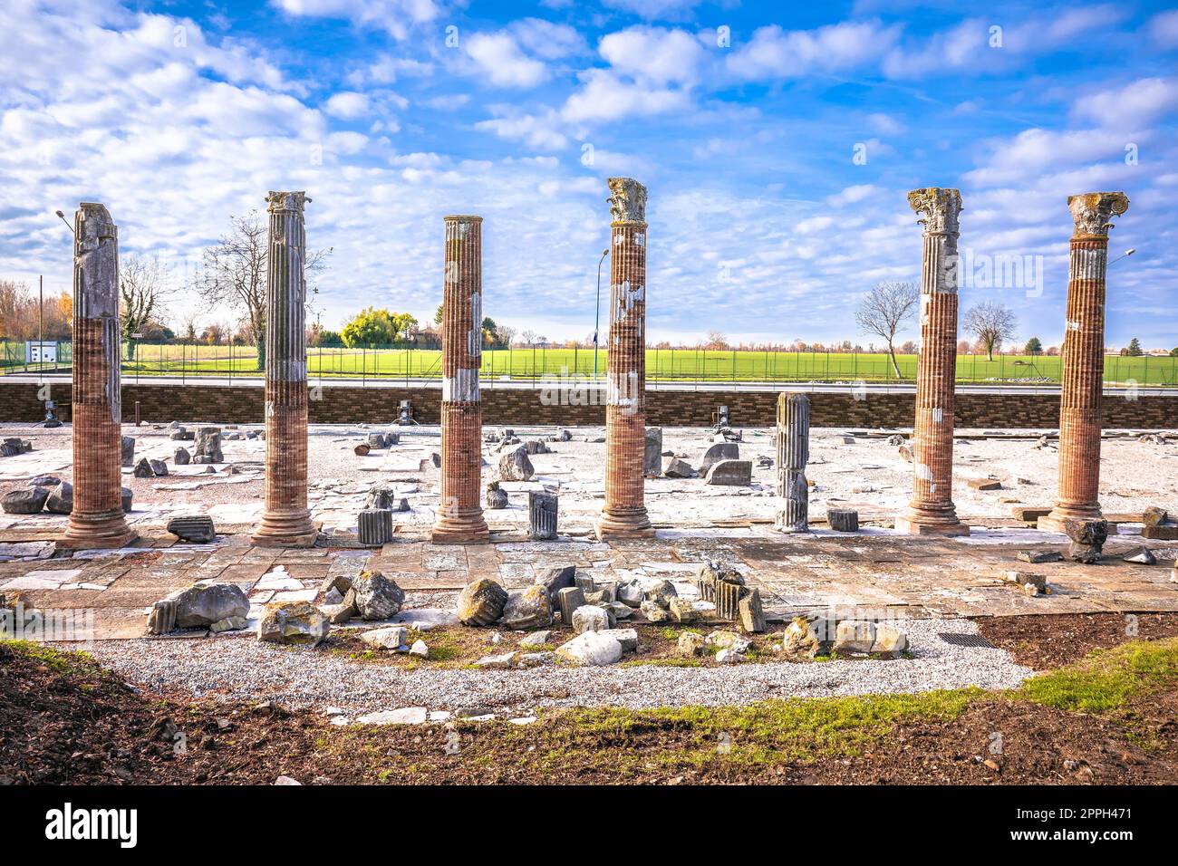 Ancient Roman columns and artefacts in historic site of Aquileia Stock Photo