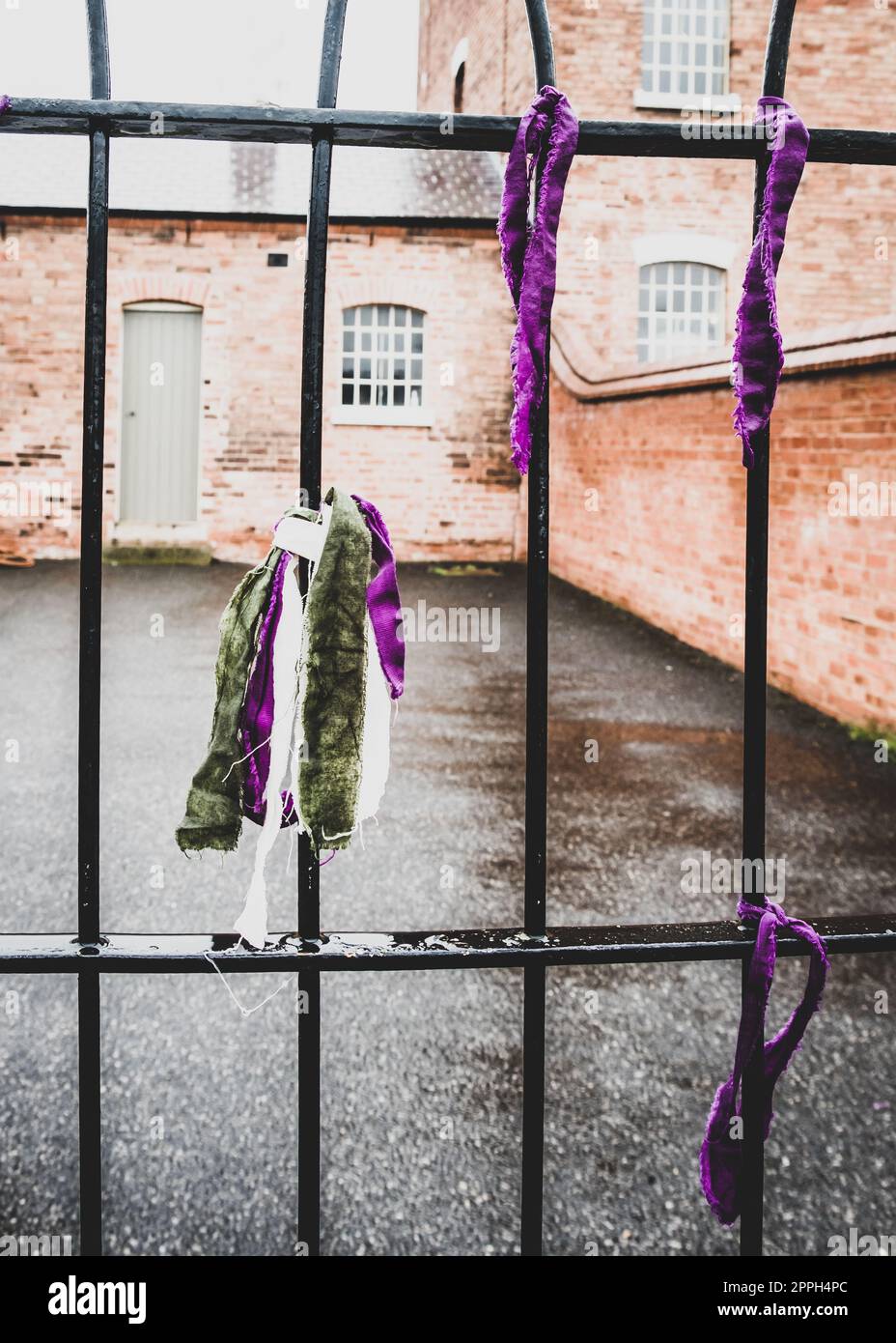Coloured ribbons attached to a courtyard. Stock Photo